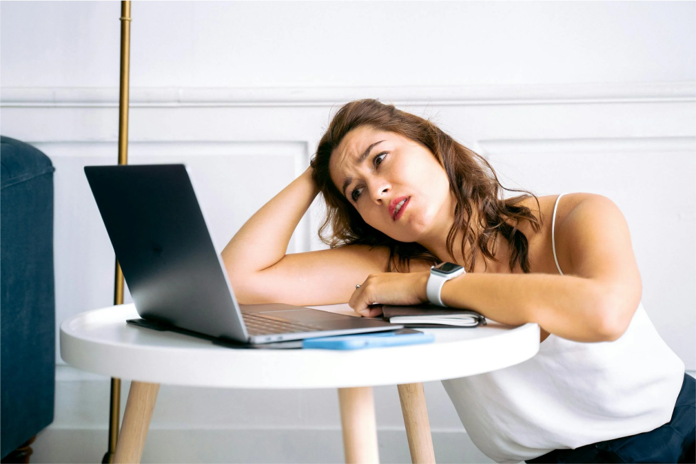 Frustrated woman, tired of reading from screen
